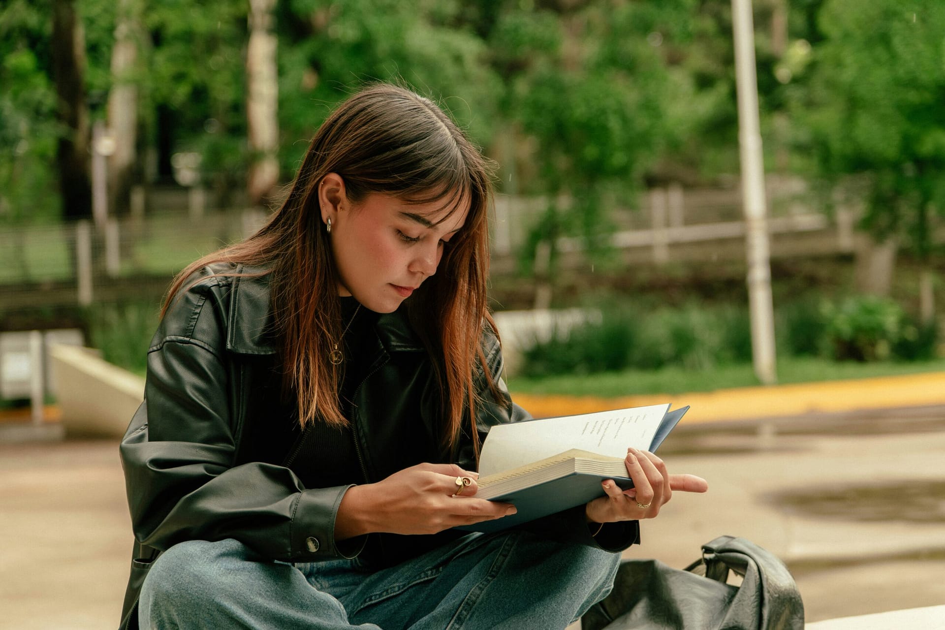 reading girl in park