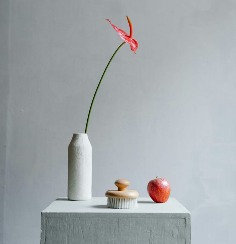 Minimalist lifestyle aesthetic with few intentional objects and clean space.